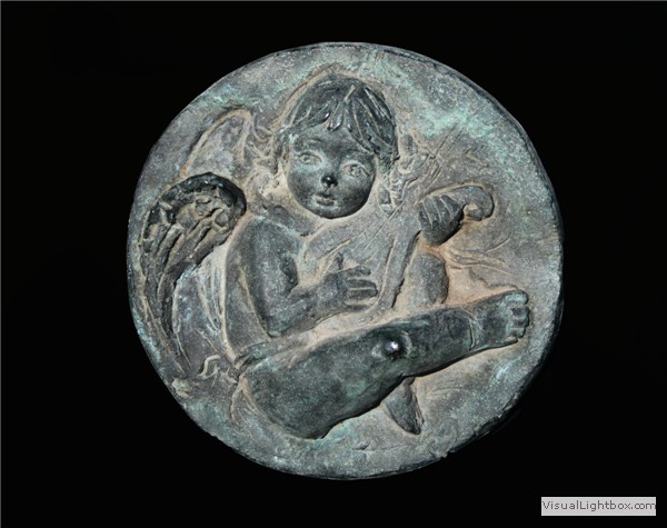 Bassorilievo puttino in terracotta